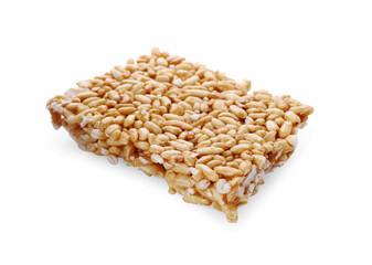 Puffed rice bar (kozinaki) on white background
