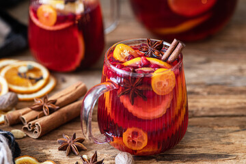 Mulled wine with spices and orange. Traditional drink on winter holiday