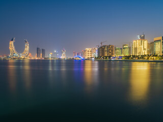 Lusail city lights and modern buildings on the beachfront in Doha, Qatar