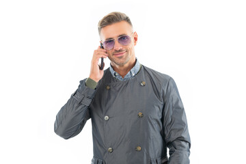 Happy smiling business man businessman manager talking on mobile phone in formal coat
