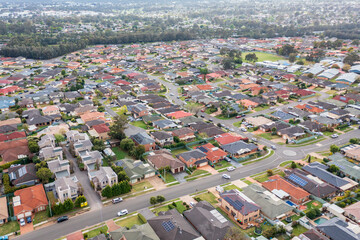 Obraz premium Drone aerial photograph of houses and roads in the suburb of Glenmore Park in New South Wales in Australia