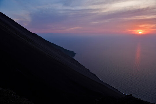 Coastline of Stromboli Island at sunset.; Stromboli Island, Italy.