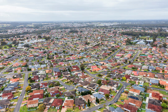 Drone aerial photograph of houses and roads in the suburb of Glenmore Park in New South Wales in Australia