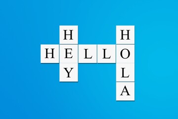 Hey Hola Hello letters, tiles against blue background.