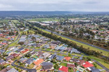 Drone aerial photograph of houses and roads in the suburb of Glenmore Park in New South Wales in Australia