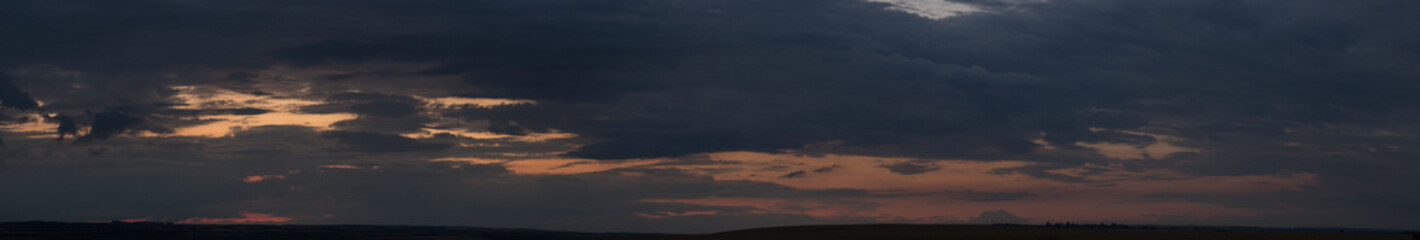 Blackout. Tragic gloomy sky. Landscape with bloody sunset. Fantastic skies on the planet earth. Twilight, nightfall.