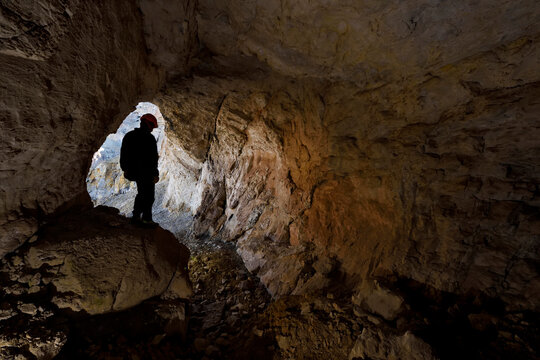 One level on a cliff face containing three caves remained illusive. The team had been forced to look at it from their camp and often pondered about access and how to climb up to it. This set of photog