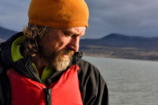 Portrait of chief boatman and reliable expedition member. Photograph taken whilst he was in total control of the Zodiac 3 inflatable boat on lake Centrum.