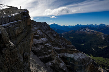Expedition leader makes a telephone call to the helicopter company asking about their availability to fly and pick up the teams equipment.