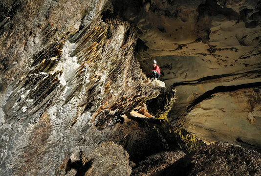 A Mulu Cave Project expedition member examines unusually rare phytokarst rock spikes.