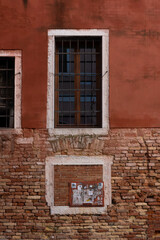A composition of a Venitian building facade.