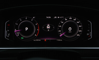 Сompass on the digital dashboard of modern car. Modern digital car mileage. GPS navigation.