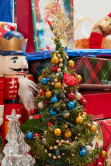toy christmas tree and other decorations and presents