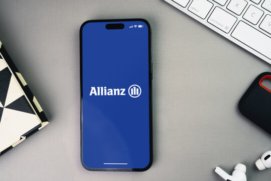 Allianz insurance and asset management app on the smartphone screen on grey background table. Office environment. Rio de Janeiro, RJ, Brazil. December 2022