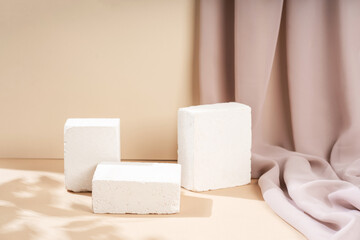 Composition empty podium material tree stone dry flowers. Beautiful beige background made of natural materials for product presentation.