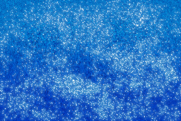 scintillement de lumière sur fond bleu hivernal