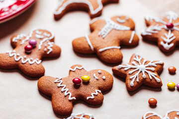 Obraz na płótnie Canvas Various selection of Gingerbread cookies with sugar icing. Decorated in Christmas spirit. Happy New Year celebration. Playful and fun. 