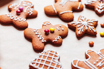 Various selection of Gingerbread cookies with sugar icing. Decorated in Christmas spirit. Happy New Year celebration. Playful and fun. 