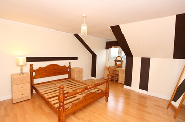 wooden paneled bedroom flooring 