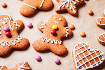 Various selection of Gingerbread cookies with sugar icing. Decorated in Christmas spirit. Happy New Year celebration. Playful and fun. 