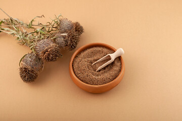 Milk Thistle Powder. Milk Thistle Oil cake or Silybum marianum extract and dried plants flowers....