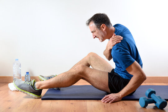 Man doing sport indoors complaining with clavicle pain