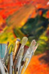 Fototapeta premium Paint brush and art tools for painting in studio workplace