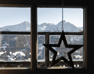 Beautiful view through the window on the mountain range in the Alpine region, Austria, Salzburg