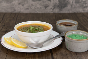 Traditional Indian meal starts with a delicious vegetable soup with humus dipping sauce for extra flavor