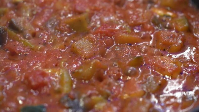 Cooking Ratatouille, French Dish Of Stewed Vegetables. macro