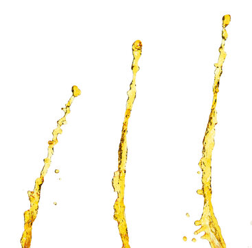 Orange, lemon juice or oil lubricant splash, liquid gold yellow drink drops. Fruit beverage water elements in line form . Fresh splashing and flowing jets, white background isolated freeze motion