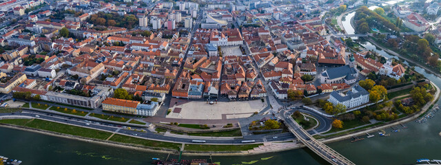 Aerial wide view around the city Győr in Hungary on a cloudy autumn day.