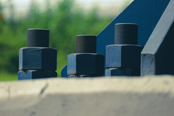 The blue bolts and nuts of the structure with large dimensions are made of high quality steel, high...