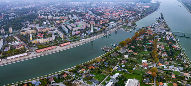 Aerial view around the city Komárno in Slovakia on a cloudy afternoon in autumn.