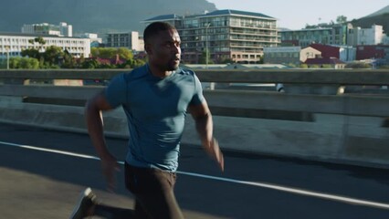 Man, city road and running fast for fitness wellness, sports workout and exercise training for athletics sports or marathon outdoor. Healthy, active athlete or speed runner for cardio performance - Powered by Adobe