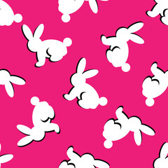 Seamless background with silhouettes of white rabbits
