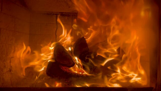 Burning fire in the fireplace