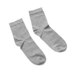 Pair of grey socks isolated on white, top view
