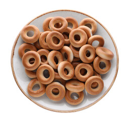 Plate with tasty dry bagels (sushki) isolated on white, top view