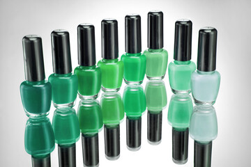 Set of nail polish on grey background
