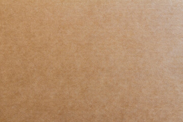Cardboard texture with light gradient for background.