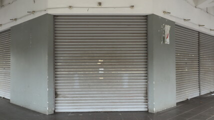 Shop Facade with Metallic Door Shutters