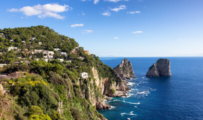 Fototapeta premium Touristic Town on Capri Island in Bay of Naples, Italy. Sunny Blue Sky.