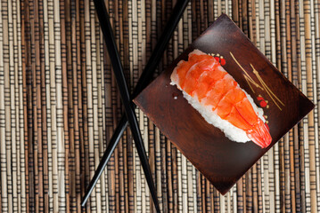 Sushi Set nigiri shrimp on wood,top view, close up
