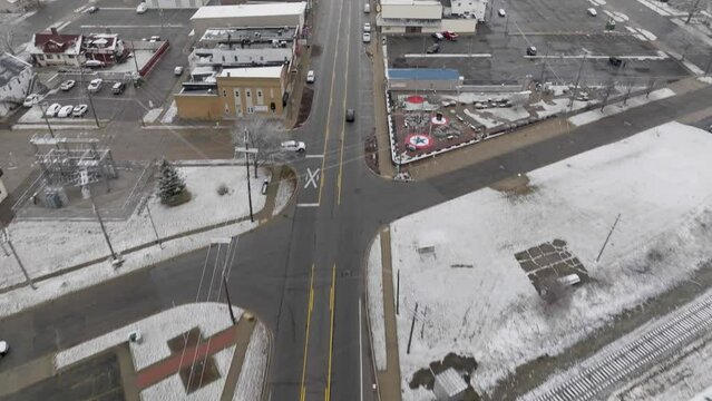 Small town Clio Michigan Aerial tilt up reveal