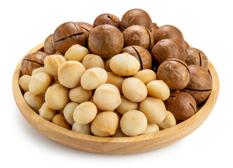 Roasted Macadamia nut in wooden plate on wooden background, Macadamia nuts on wooden background.