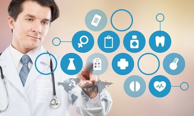 Medical doctor with digital hologram icons.