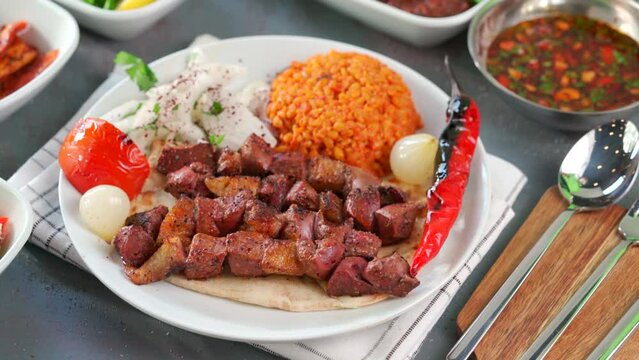 Traditional Turkish meal kebab, Ali nazik, adana kebap, urfa kebap, &ccedil;&ouml;p şiş, patlican kebap, domates kebap, şaşlık, saslik, ciger sis on table top view
