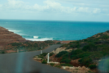 Obraz premium Kalbarri's rugged red rock coastline