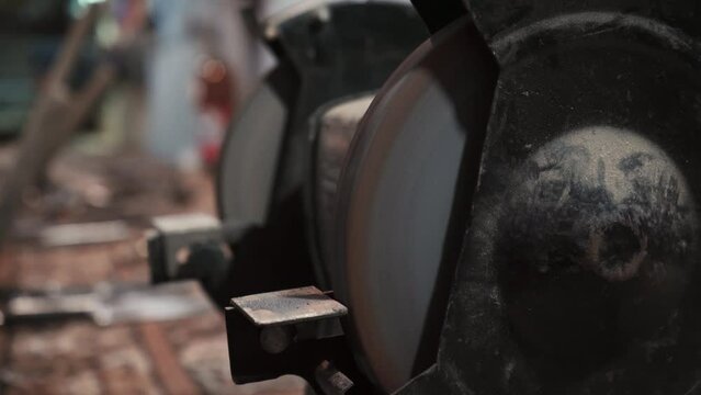 Sander emery close-up. Selective selective focus. Apparatus in the workshop for sharpening tools.